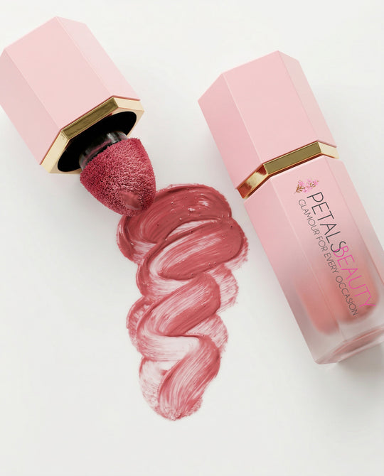 Pink Velvet liquid blush open with doe-foot sponge tip showing rosy pink formula