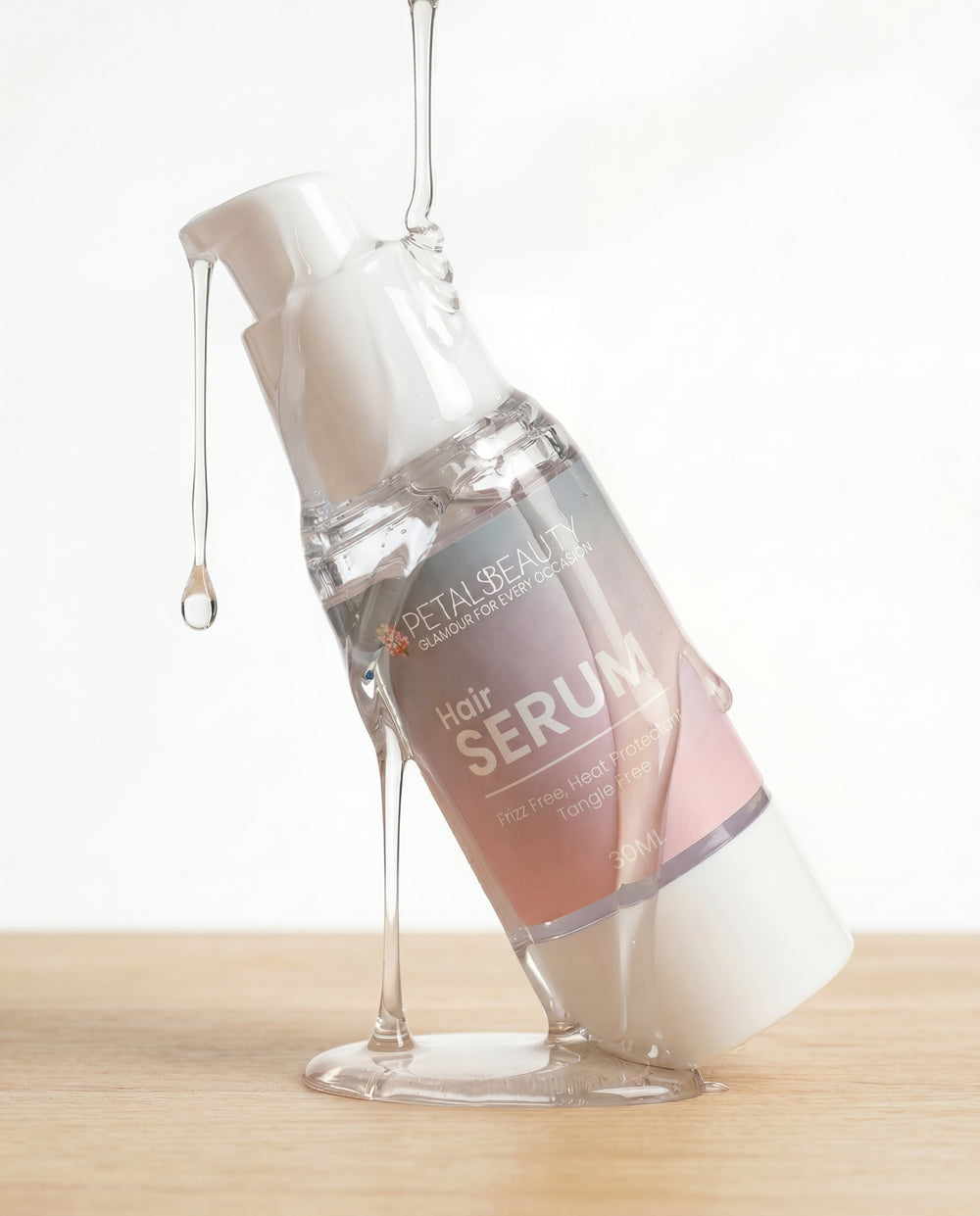 Hair serum bottle with dropper on a light background