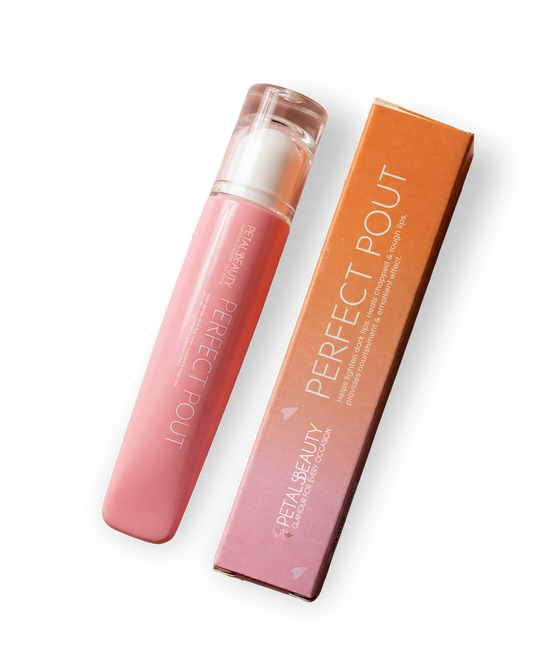 Perfect Pout Caramel Kiss lip gloss tube by Petals Beauty on a plain background