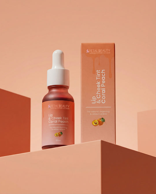 Coral Peach lip and cheek tint bottle with warm coral formula