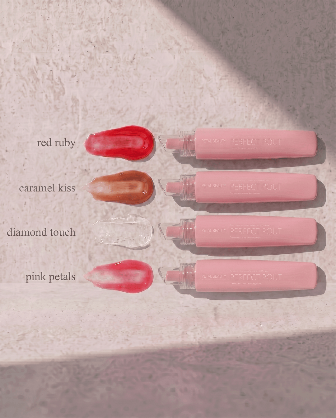 Perfect Pout lip gloss in four shades: Red Ruby, Pink Petals, Caramel Kiss and clear Diamond Touch