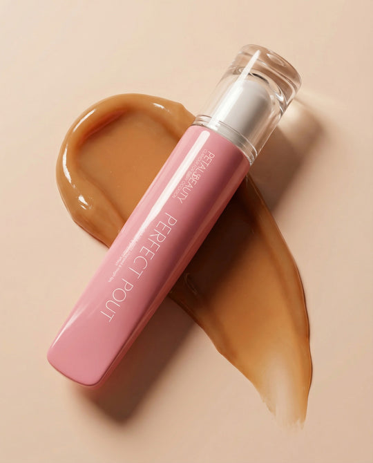 Caramel Kiss caramel nude lip gloss tube with its doe-foot applicator wand
