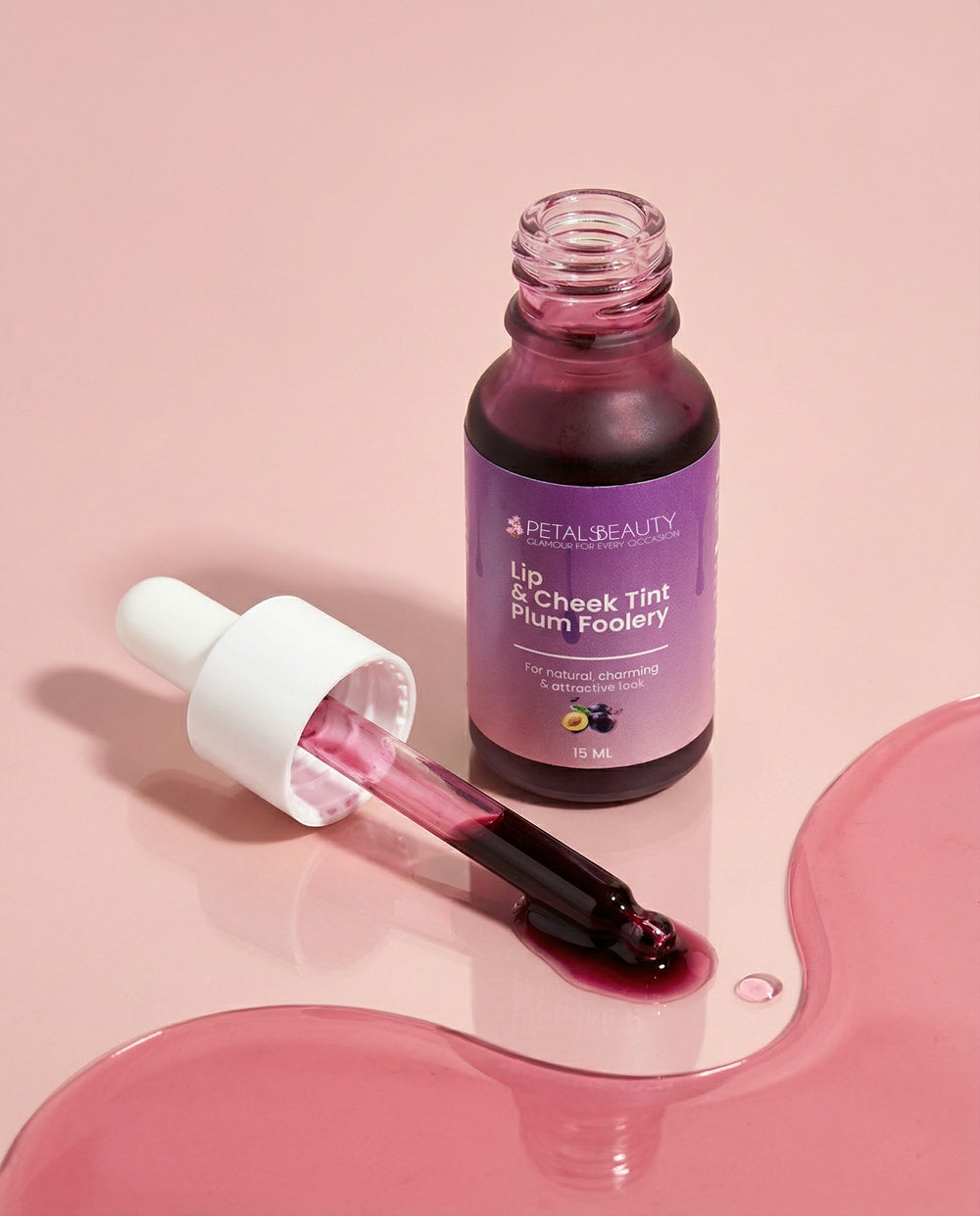 Plum Foolery lip and cheek tint bottle with deep plum formula