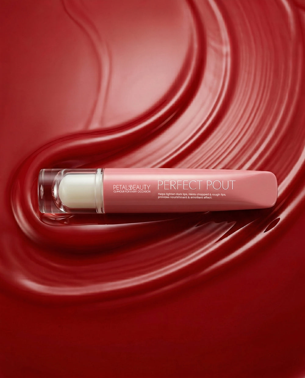 Red Ruby lip gloss with doe-foot applicator showing glossy ruby-red color