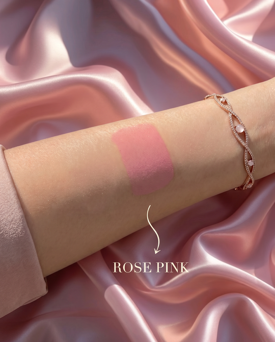 Rose Pink liquid blush swatch blended on skin showing soft dewy finish