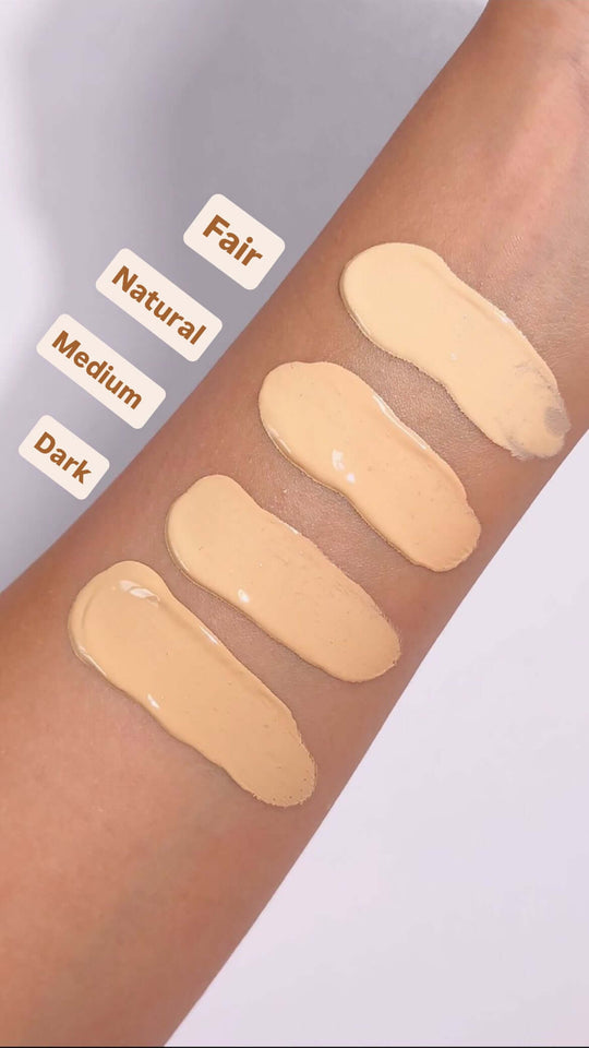 Silk Skin Skin Tint held in hand showing the 40ml bottle and pump